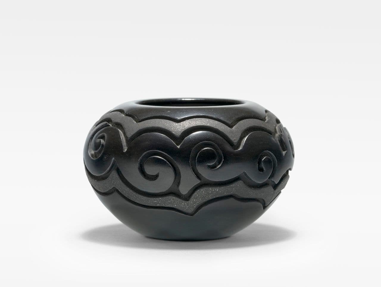 Blackware Miniature Vessel
Linda Tafoya-Sanchez
20th Century,21st Century
2022.77.38 Blackware Miniature Vessel
Linda Tafoya-Sanchez
20th Century,21st Century
2022.77.38
