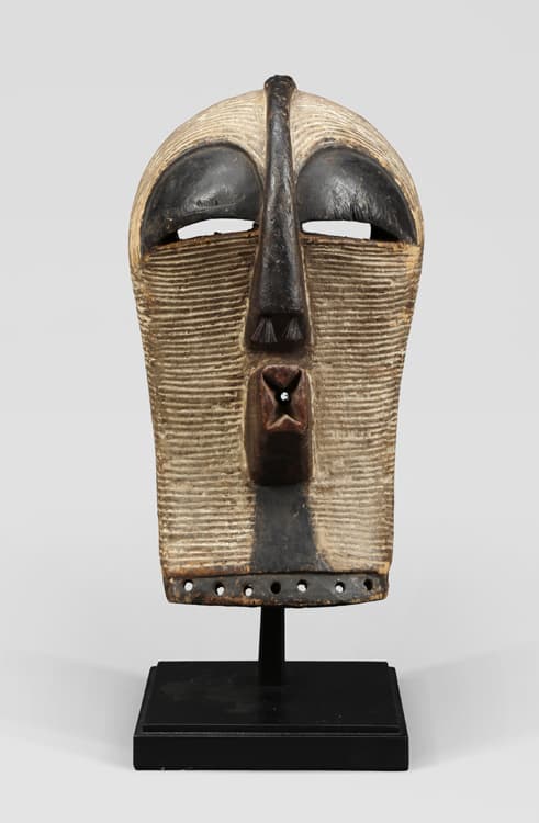 Songye people, Democratic Republic of the Congo, Female Songye Kifwebe Mask, 20th century. Wood, pigment, and fiber. Crocker Art Museum, gift of Meghan and David Potter, 2016.82.